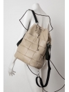 Taupe quilted leather drawstring bag